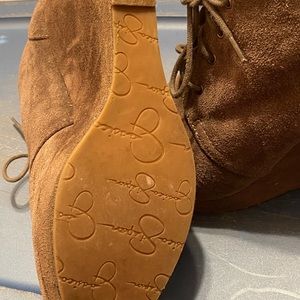 Platform heel boot worn with care